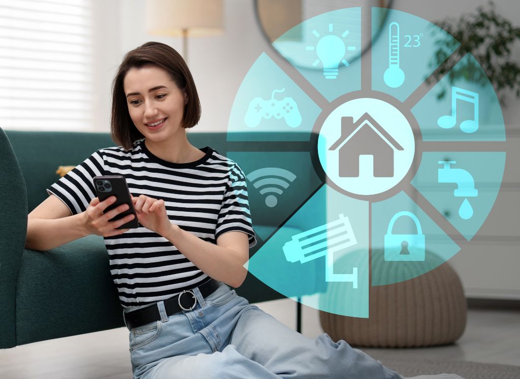 Kobieta sterująca systemem inteligentnego domu za pomocą smartfona